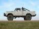1978 Ford F-150 - This modified 1978 Ford F-150 features a lifted suspension and off-road tires.