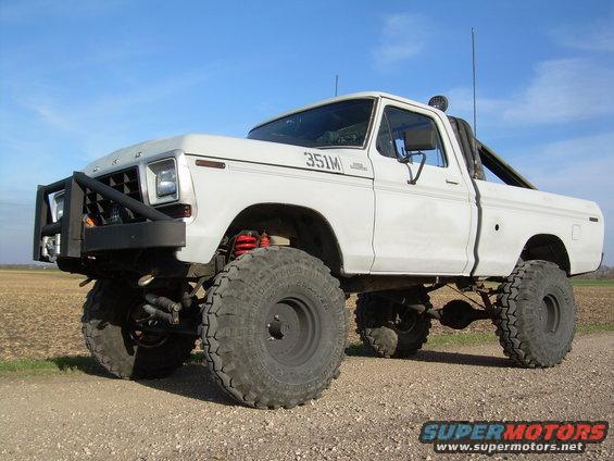 White 1978 Ford F-150 with 351M badging and off-road modifications