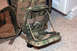 1991 Ford Bronco - A close-up view of an open pouch on a camouflage tactical backpack, revealing its internal organization.