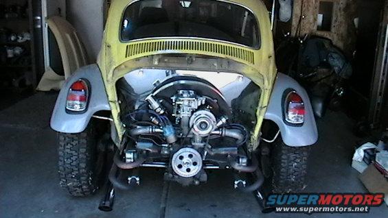 Before taking the carburetor apart, no cage on the wheels. Notice the fenders and lights aren't straight :) that'll be fixed in the near future.