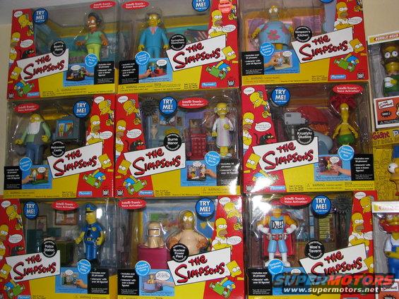 Collection of The Simpsons action figures in their original packaging