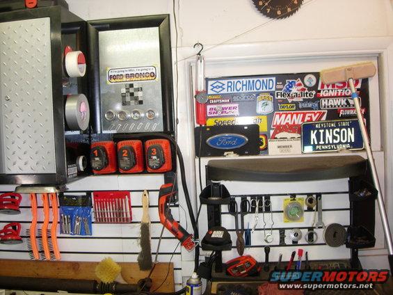Ford Bronco sticker on a tool cabinet with various tools and items
