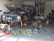 1978 Jeep Cherokee - A 1978 Jeep Cherokee is shown in a garage with its front end disassembled and axles removed for repair or modification.