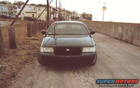 Front view of a black 1998 Ford Crown Victoria