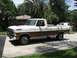 1972 Ford F-100 - This two-tone 1972 Ford F-100 pickup truck is shown from a 3/4 front angle.