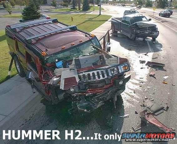 Damaged red Hummer H2 with front-end collision, debris on road