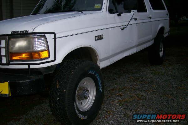 White 1992 Ford C-350 Centurion Conversions SUV, 3q front view
