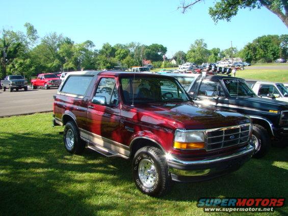Red 1994 Ford Bronco 3/4 front view