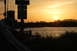 1983 Ford Ranger - Sunset over water with a highway sign for Business 101 and Lewis and Clark River.