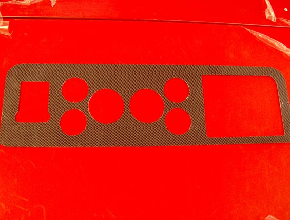 carbon-fiber covering the dash.