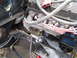 1979 Ford Bronco - Ford V8 engine components including starter motor and exhaust manifold are visible in this close-up shot.