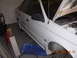 1995 Ford Taurus - This 1995 Ford Taurus sedan is shown in a garage with its hood open.