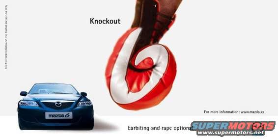 Blue 2003 Mazda 6 front view with boxing glove overhead
