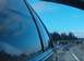 1996 Chevrolet Impala - Driving on a highway with other cars and trees visible under a clear blue sky.