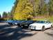 1996 Chevrolet Impala - Multiple Chevrolet Caprice sedans are parked in a line, with trees in the background.