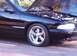 1996 Chevrolet Impala - Front view of a 1996 Chevrolet Impala with its hood open, parked outdoors.