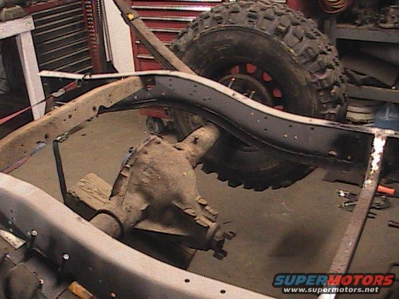 close-up of truck frame, suspension, and differential