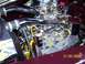 1972 Ford Ranchero - Engine bay details with shiny chrome components and bright yellow wiring are visible.