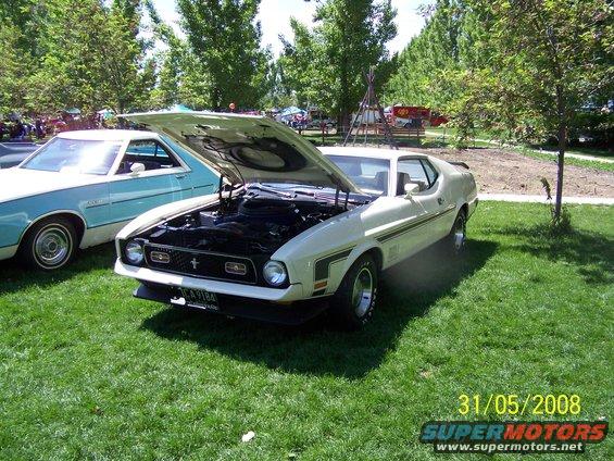 White 1971-1973 Ford Mustang, 3q-front view, hood open, showing engine