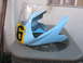 2005 Yamaha R1 - A light blue motorcycle fairing with a clear windscreen and a yellow number plate displaying the number 6 is shown.