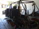 1994 Jeep Cherokee - The interior of a Jeep Cherokee is visible, a roll cage and stripped-down body panels.