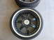 1996 Ford Probe - A close-up view of two custom car wheels and tires, likely aftermarket parts.