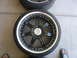 1996 Ford Probe - A close-up of a black aftermarket wheel and tire, showing its intricate design and polished rim.