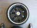 1996 Ford Probe - Aftermarket wheel and tire assembly shown from above on a concrete surface.