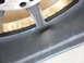 1996 Ford Probe - A close-up view shows damage to a wheel rim, with the brand name 'LENSO' visible on one of the spokes.
