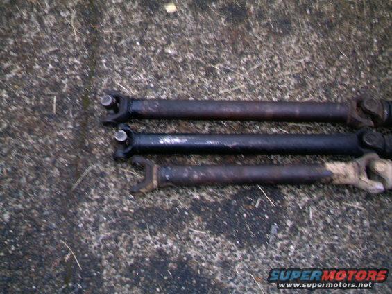 Three front driveshafts The shortest is a shortened shaft for a D-35 conversion on a FM145 transmission application
the middle one is a stock length FM145 shaft, and perfect in length for a D-35 FM146 set up
The long one is a stock length FM146 shaft