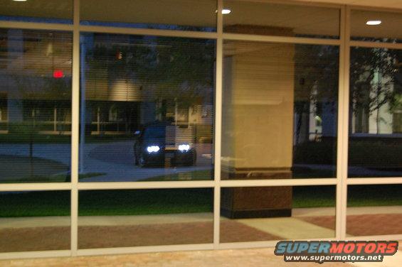 2002 BMW M3 front view, headlights on