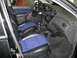 2003 Ford Focus - Interior view of a 2003 Ford Focus, showing the front seats and dashboard.