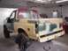 1996 Ford Bronco - This 1996 Ford Bronco is undergoing body repair and is covered in primer and masking tape.