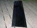 1989 Ford Probe - A black door trim piece is shown against a wooden deck background.