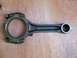 1972 Ford Ranchero - A single connecting rod, likely for a Ford 429 engine, is shown against a wooden background.