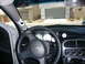1996 Ford Probe - The interior of a Dodge Neon SRT-4 is visible, aftermarket gauges and a steering wheel with a Dodge emblem.