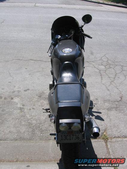 Motorcycle's rear end with a license plate that reads 13C1736