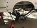 1996 Ford Bronco - Close-up of a vehicle's rear suspension system, showing leaf springs and brake components.