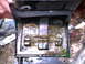 1987 Ford Bronco II - A close-up view of a corroded heater core assembly, showing signs of leakage and debris.