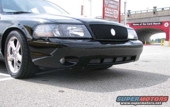 Black 2003 Mercury Marauder front grille and headlights, low angle view