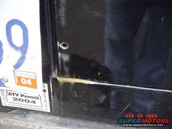 This is where the tailgate door was rubbing due to the excess weight
