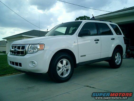 White 2008 Ford Escape parked in a driveway