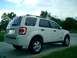 2008 Ford Escape - Rear-left view of a white 2008 Ford Escape SUV parked outdoors.