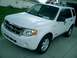 2008 Ford Escape - Front 3/4 view of a white 2008 Ford Escape SUV.