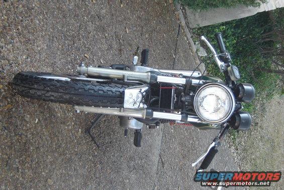 Motorcycle front view with chrome accents and round headlight