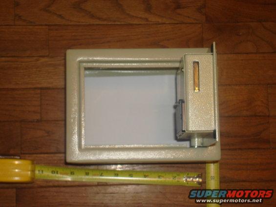 safe-02.jpg it has mounting holes in the bottom and rear. this is great to hold some spare cash,keys, pocket book and RV information.