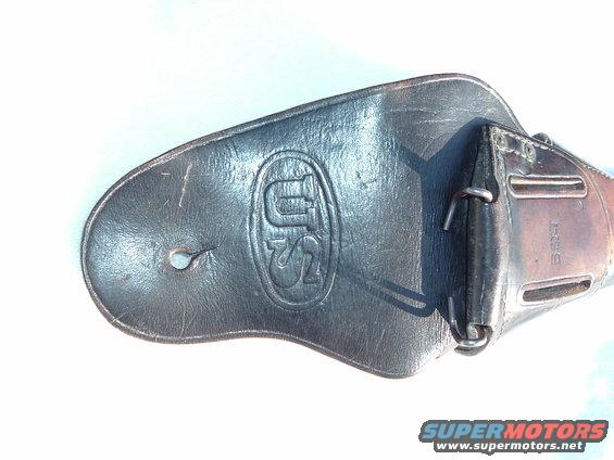 Leather part with embossed US insignia and metal hardware