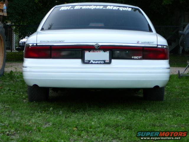 1997 Mercury Grand Marquis rear view with custom sticker on back window