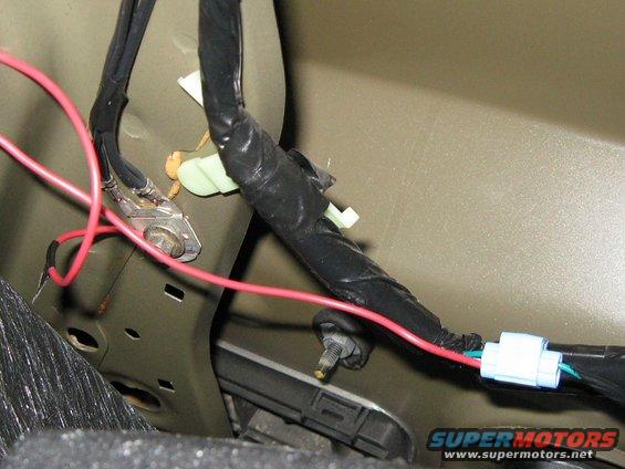 dontdothis.jpg This is how I wired it up the first time. I thought it was switched on the positive wire (green), but it was actually switched on the ground wire (black w/ red stripe). This made the light stay on all the time. DON'T WIRE IT UP LIKE THIS!!!