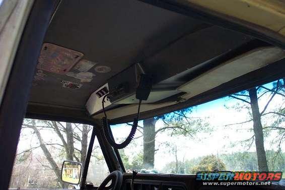 1979 Ford Bronco interior showing overhead console with CB radio and coiled cord